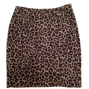 CAbi animal print skirt.  Super-stretchy material with exposed back zipper.